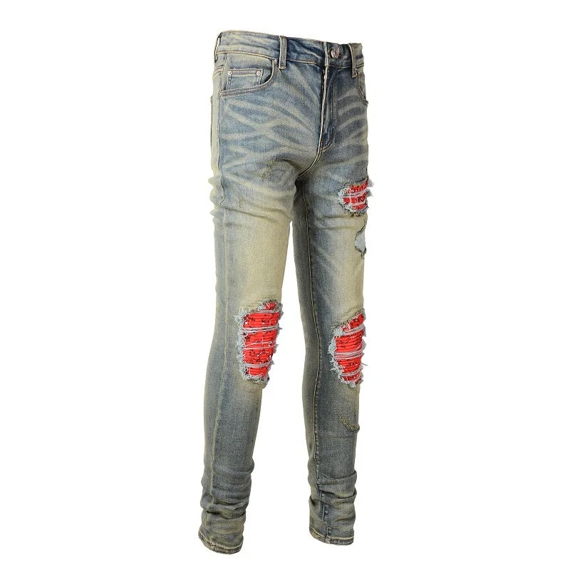 jeans blu strappi arancione